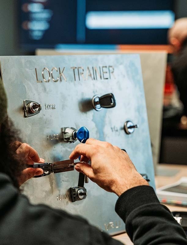 Image of a locksmith using a pickboard.